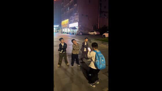 Boy films three others moving in Chongqing, China