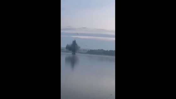 Fishermen watch drone crash into lake in Bryansk Oblast, Russia