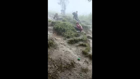 Rainy climb mishap: unplanned descent captured in Indonesia
