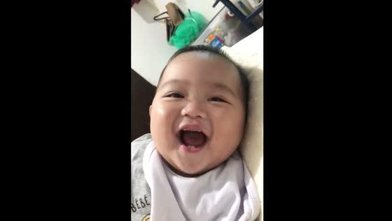 Baby's adorable vampire teeth charm in San Juan, Bulacan
