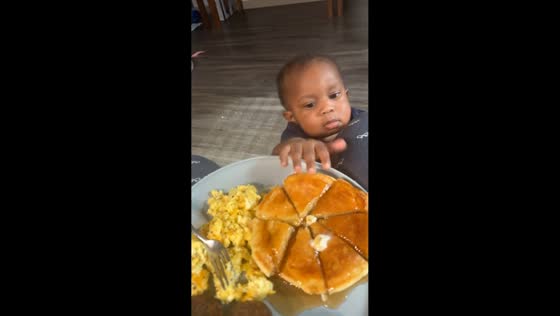 Toddler sneaks pancake in Henderson, Texas