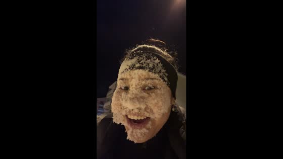Attempting to imprint a face in the snow in Zurich, Switzerland