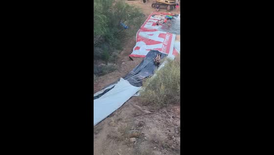 Homemade hillside slip-and-slide ends in splash with friends in Camp Verde, Arizona