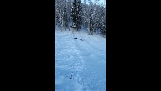 Snow tubing fun ends with a stumble in Beijing, China