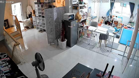 Woman slips on door mat and crushes laundry basket in Bangkok, Thailand