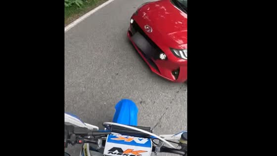Motorcycle rider collides with car in Italy