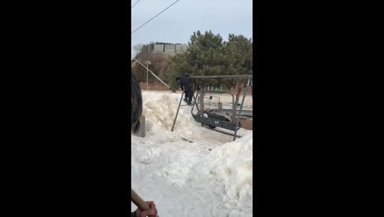 Snowboarder collides with swing beneath ramp in Beijing, China
