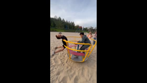 Children spin playground ride at high speed in Oisterwijk, Netherlands
