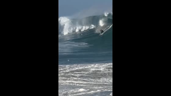 Surfer rides powerful wave at The Wedge in Newport Beach, California, USA