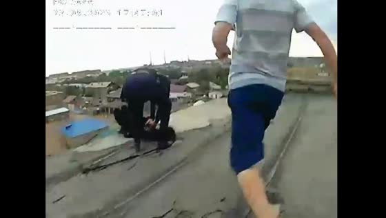 Police rescue desperate girl from rooftop suicide attempt in Balkhash, Kazakhstan