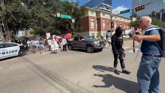 Demonstrators march through Dallas during RNC Midterm Convention in Texas, USA