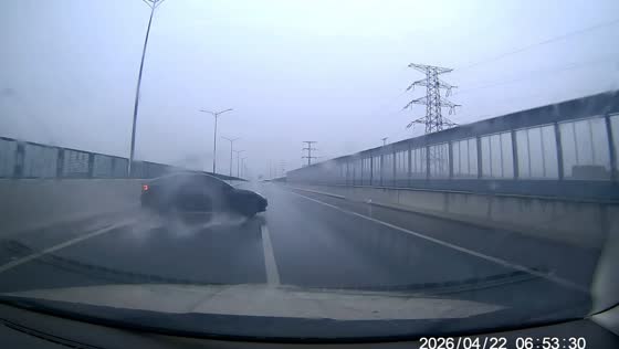 Car spins into barrier on rain-slick highway in Zhuji, Zhejiang, China