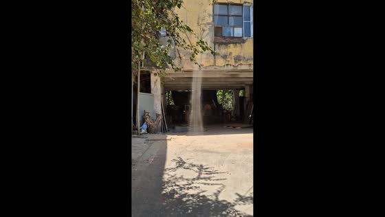 Dust devil spins through residential area in Mumbai, India