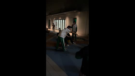 Man falls after running from spinning chair in Tianjin, China