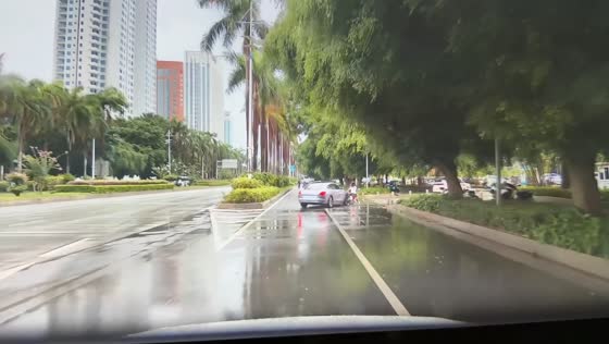 Motorcycle riders knocked down in rainy road collision in Guangxi, China
