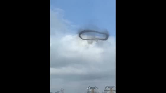 Mysterious black smoke ring captured in Moscow sky