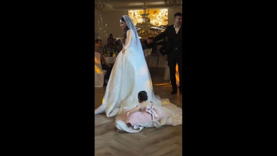 Baby slips on bride’s gown during wedding in Stavropol, Russia