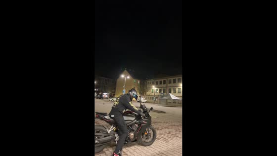 Motorcyclist falls after kickstand slips in Berlin, Germany