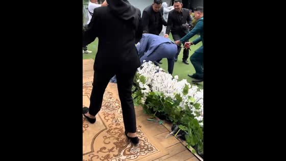 Bride falls after bouquet toss at Bandung wedding in West Java, Indonesia