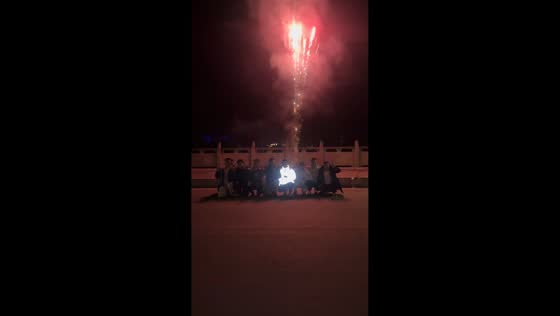 Man in flashy jacket steals spotlight during fireworks photos in Sichuan, China
