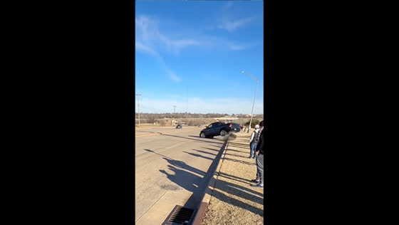 Speeding pickup truck loses control and tire on sharp turn in Oklahoma City, USA