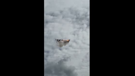 Reconnaissance plane roars over Barnaul before Russian Knights flyby
