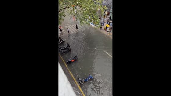 Floodwaters nearly knee-deep after continuous rain in Manila, Philippines
