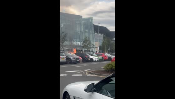Black Vauxhall Corsa bursts into flames at shopping centre in Glasgow, UK