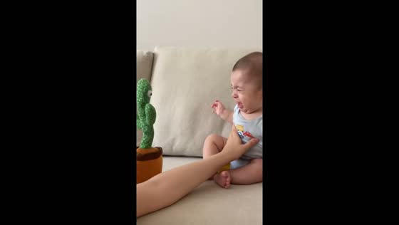 Baby gets scared by talking cactus toy