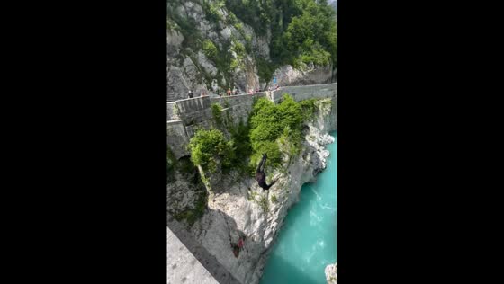 Thrilling leap: daring dive from Napoleon's Bridge, Slovenia
