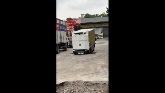 Autonomous delivery robot gets stuck in warehouse pit in Guangdong, China