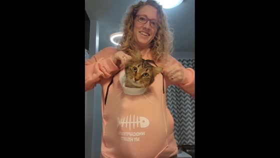 A talented designer created a cozy pet carrier hoodie