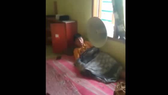 Loud prank! Friends woke the guy up with a loudspeaker!