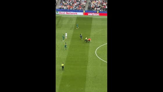 Pitch invader brought down by security during football match in Seattle, USA