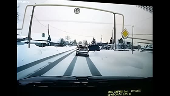SUV driver ties child on snow scooter to car and drives on busy road in  Russia