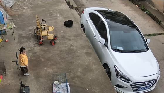 Toddler accidentally falls from a raised porch near a parked car in Guangzhou, China