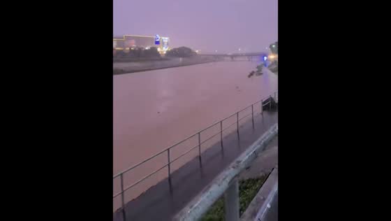 Sudden lightning bolt surprises man near river in Marikina, Philippines