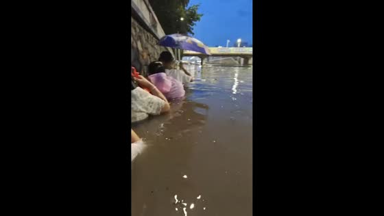Deep floodwaters overwhelm roadway in Heilongjiang, China