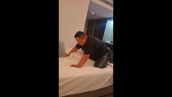 Man falls asleep kneeling on bed in Shaanxi, China