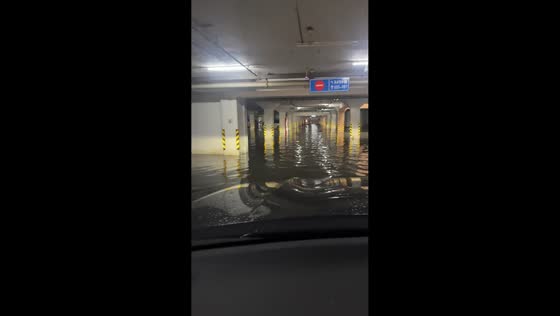 Heavy rainstorms leave underground parking garage flooded in Hebei, China