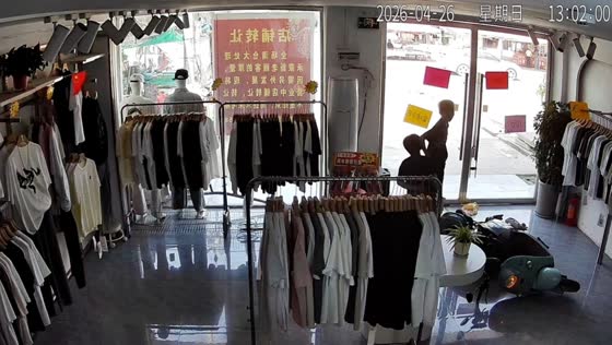 Scooter crashes into shop glass door in Beijing, China