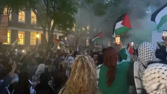 Pro-palestinian demonstrators chant 'I believe that we will win' at SOAS university