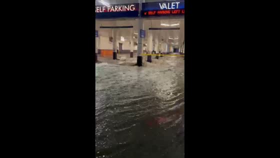 Rainwater floods The LINQ Hotel parking garage in Las Vegas, USA
