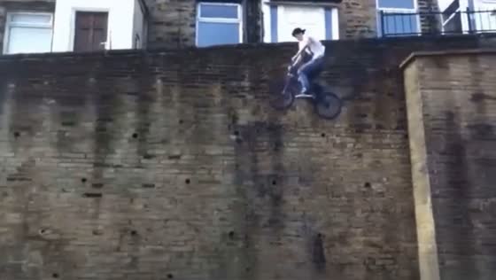 Wall ride drop: smooth landing bike bail