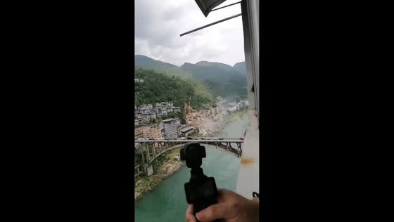 Massive landslide buries buildings at mountain base in Chongqing, China