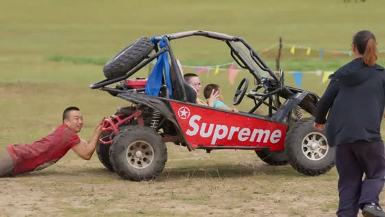 Man dragged behind runaway dune buggy carrying two children in Inner Mongolia, China