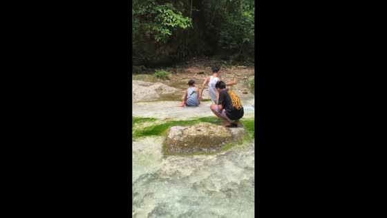 Man slips into water while dodging algae in Samal, Davao del Norte, Philippines