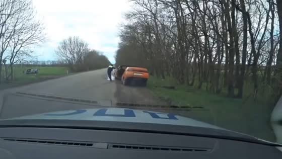 Speeding car splits in half during police stop in Yelabuga, Russia