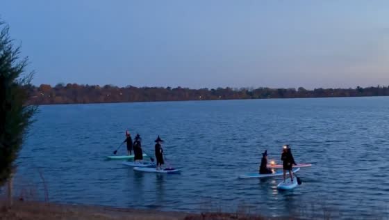 Witches paddle on Lake Harriet 