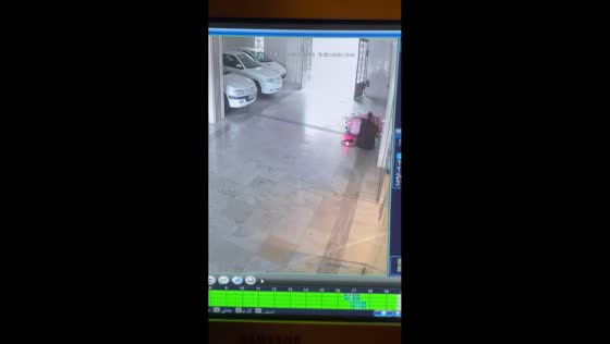 Motorcycle slips on slippery surface causing fall in Tehran, Iran